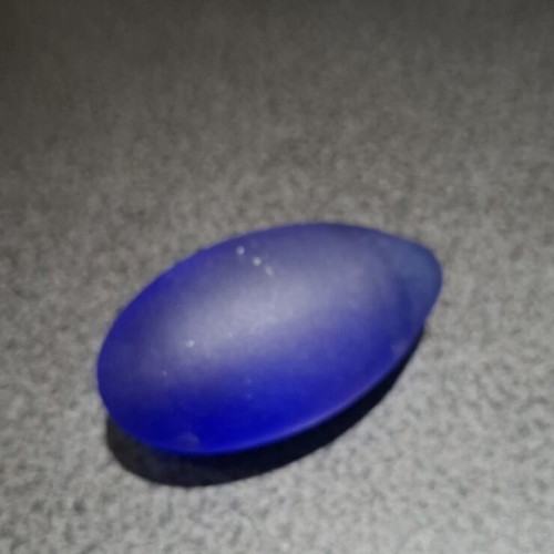 Vintage decorative crystal egg with blue matte glass and gold metal base used