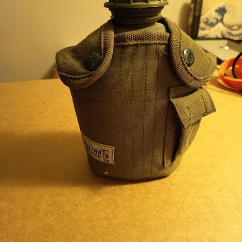 Army canteen with cover used