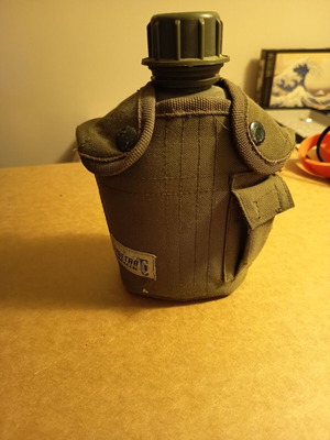 Army canteen with cover used