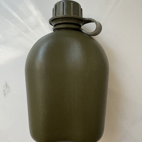 Military-style khaki water canteen with cap