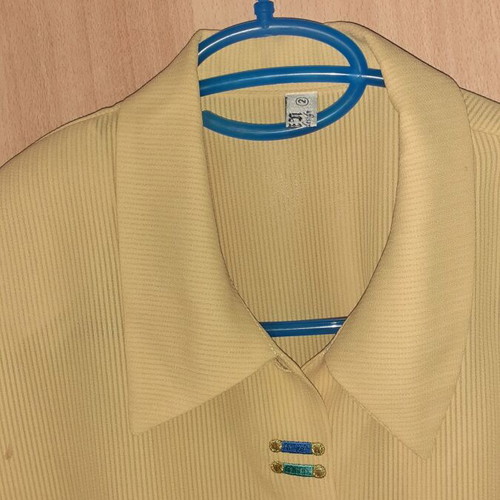 Queen shirt with shoulder pads and gold buttons like new, yellow, size S