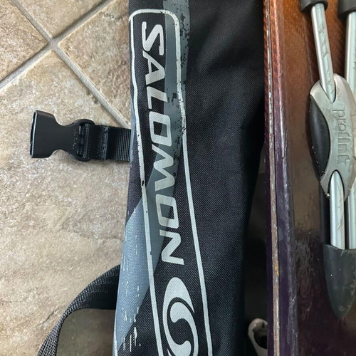 Salomon ski equipment used with bag, skis and poles