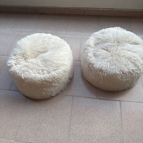 Set of 2 white fur pouf stools used