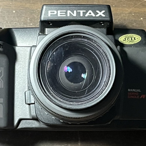 Pentax SFXn 35mm Analog Camera with SMC Pentax-F Zoom Lens like new