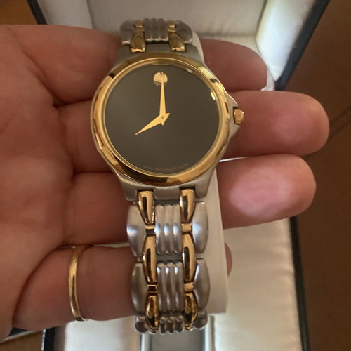 Movado wristwatch, gold and silver, new in box