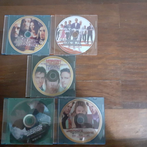 DVD pack of 5 movies like new in colored plastic case