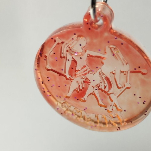 Handmade pendant with zodiac sign Gemini or Scorpio in red pigment
