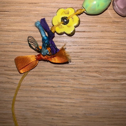 Chunky necklace used with floral metal and ceramic elements