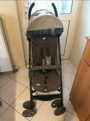 Joie stroller used with waterproof canopy