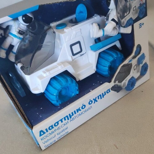 Space vehicle with two astronauts toy