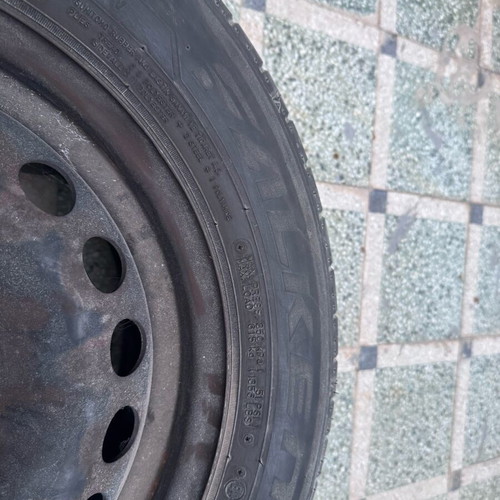 Used 195/65/R15 tires with steel rims, set of 4
