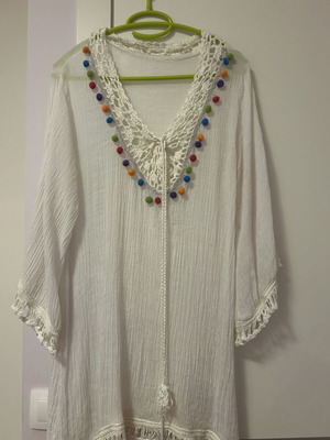White beach kaftan with colorful pom pom used