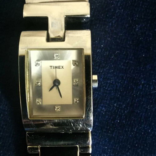Timex women's quartz watch with used silver metal bracelet