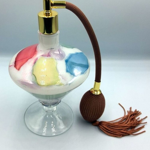 Vintage glass perfume bottle with new atomizer