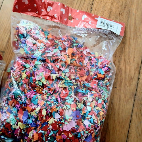 Two bags of confetti new, colorful paper pulp