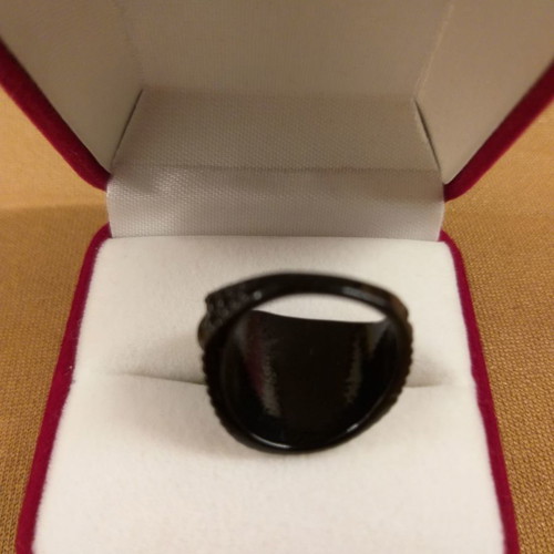 Black metal ring with embossed texture small size