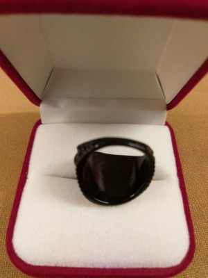 Black metal ring with embossed texture small size