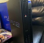 PlayStation 2 κονσόλα σαν καινούργιο με 7 παιχνίδια, χειριστήριο, καλώδια και memory card