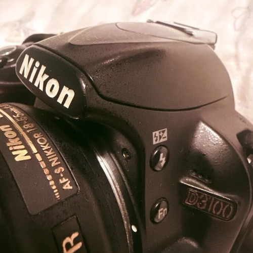 Nikon D3100 used with AF-S DX Nikkor 18-55mm VR lens and accessories