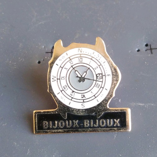 Pin's Pins montre boussole chronometre bijoux-bijoux