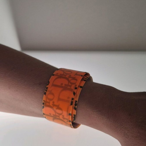 Dior foldable bracelet neon orange used