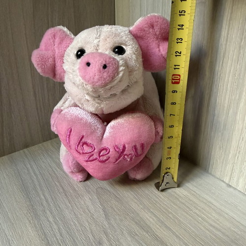 Small pink plush pig toy