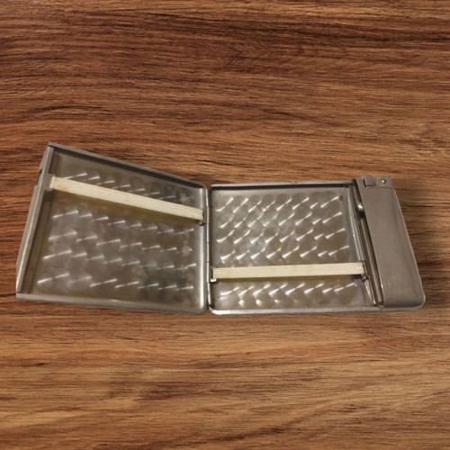 Vintage cigarette case with lighter used