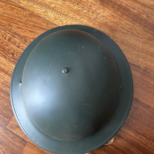 Vintage metal English-style helmet, restored