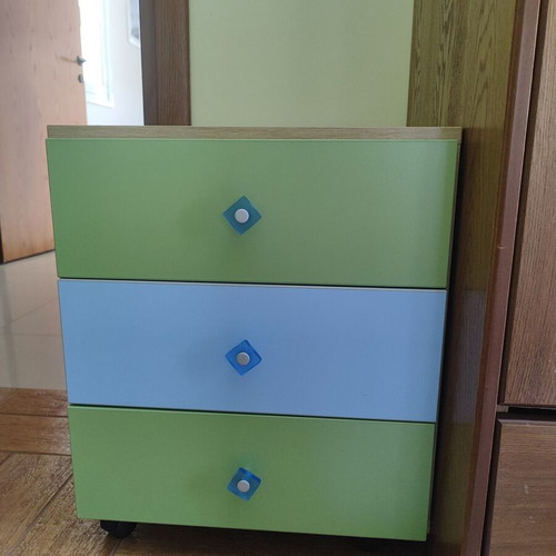 Bunk bed with three mattresses used, includes desk and drawers