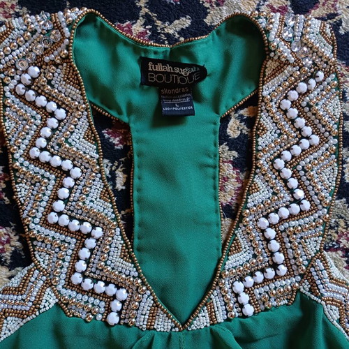 Fullah Sugah top green like new, sizes M and L