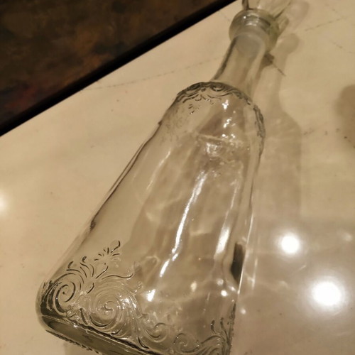 Set of transparent crystal bottles like new with decorative details