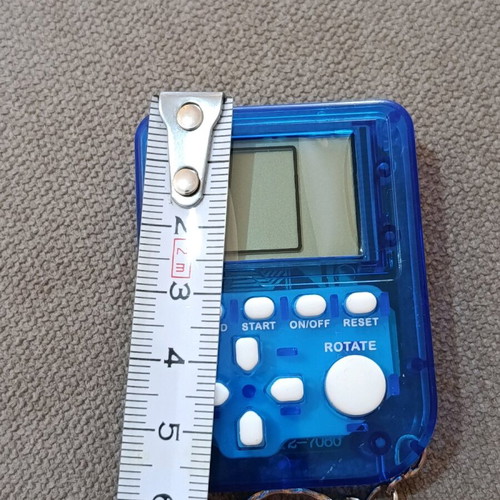 Game console keychain with many Tetris-style games new