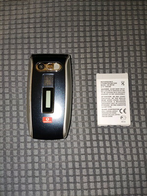 Sharp GX25 used black mobile phone with wear marks