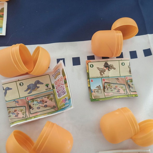 Kinder Dinosaur Egg Capsules Pack of 11 New with Paper Inserts