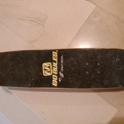 Skateboard used with protective gear for hands and feet