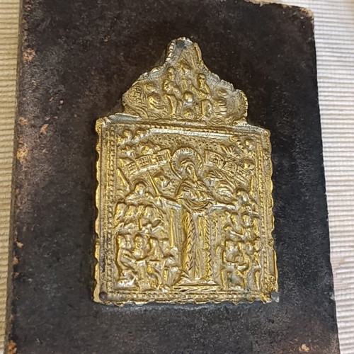 Old brass religious icon on wood, 17x14 cm