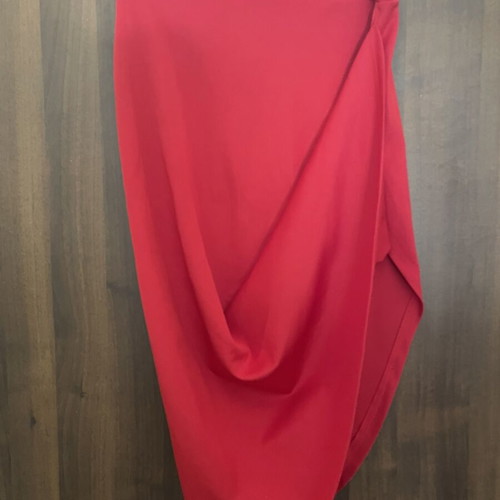 Red midi skirt with asymmetric design by TATU like new