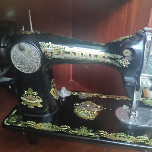 Shmens sewing machine used, antique collectible