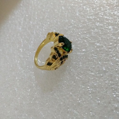 Ring with Oval Green Stone in Gold Color like new