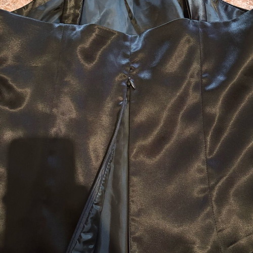 Satin top new with lace and gold details, size L