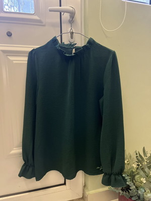 Blouse dark green size S like new with ruffle neck and cuffs