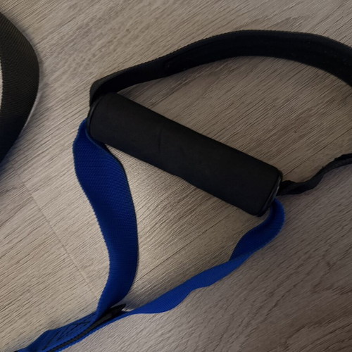 TRX strap used, blue color without ceiling hook