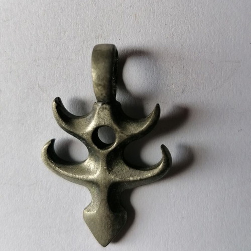 Metal Fishbone Pendant new with tribal designs