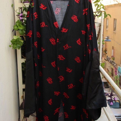 Black kimono with red ideograms like new
