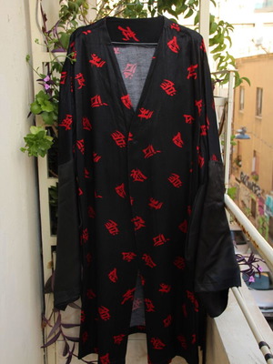 Black kimono with red ideograms like new