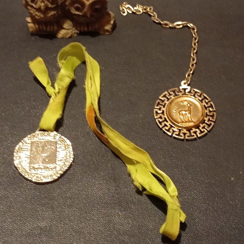 Tourist medals used with owl gift