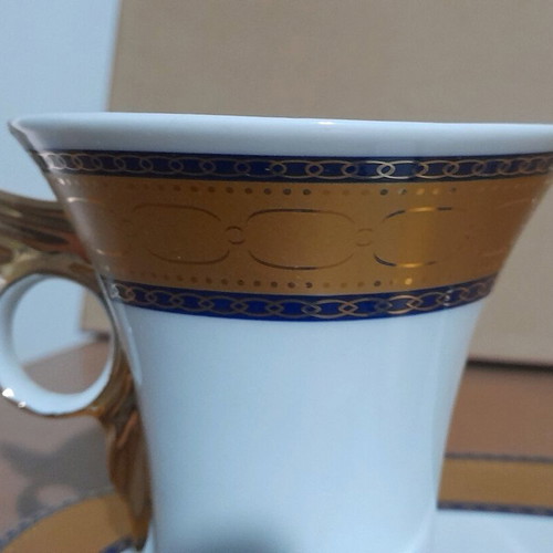 Limoge coffee cup set used, 2 cups with Hermes feather design