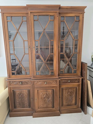 Solid wood cabinet like new with carvings and glass display doors