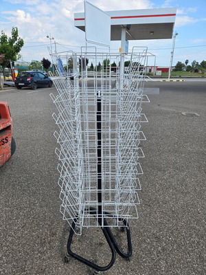 Stand quadrilateral rotating like new for magazines and newspapers