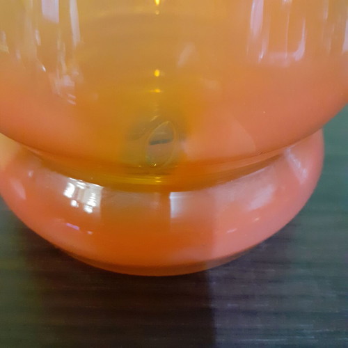 Glass vase used, vintage artistic blown glass with white and orange colors
